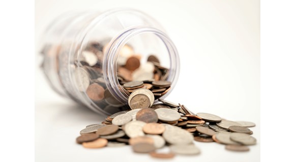 Jar of spilt coins